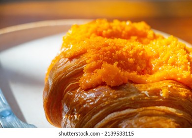 Croissant Served With Salted Egg Sauce