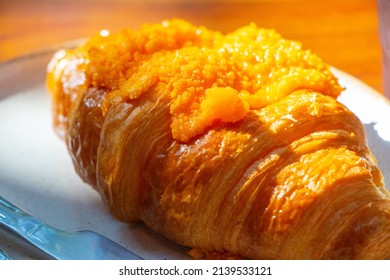 Croissant Served With Salted Egg Sauce