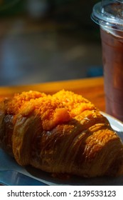 Croissant Served With Salted Egg Sauce