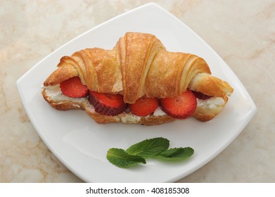 Croissant Stuffed With Strawberries And Cream