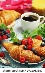 Croissants With Fresh Berries For Breakfast