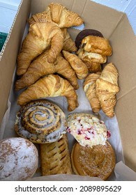 Croissants And Sweet Baked Goods In A Box