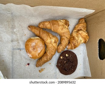 Croissants And Sweet Baked Goods In A Box