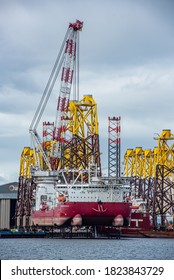 CROMARTY, SCOTLAND, UK. August 2nd 2020. Seajacks Scylla, The Worlds Most Advanced Offshore Wind Farm Installation Vessel. Loading Foundation Tripods In Cromarty Firth, Scotland