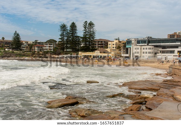 Cronulla,\
Australia 2020-02-15 Huge waves during the storm washed away\
thousands of tonnes of sand into the ocean, exposing masses of\
boulders at the northern end of the\
beach