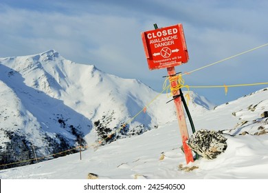 Crooked Red Avalanche Sign in Canadian Rockies