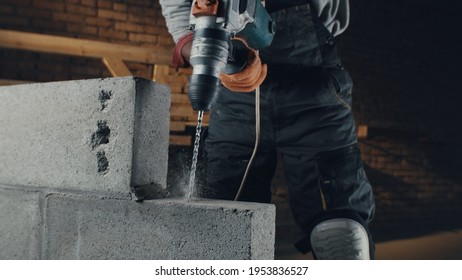 Crop Builder Drilling Concrete Brick