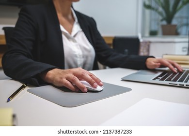 Crop Businesswoman Using Wireless Mouse