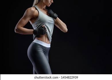 Croped image of sideview beautiful fit girl. Energy fitness motivation, workout, sport, lifestyle concept. Copy space. Workout bodybuilding concept. Fitness exercise.