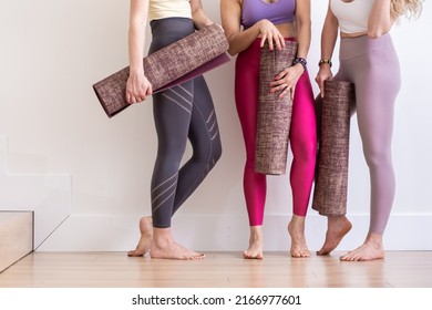 Croped Three Happy Smiling Young Woman Holding Yoga Mat In Sport Wear In White Studio, Yoga Teacher, Workout, Stretching Sport Copy Space