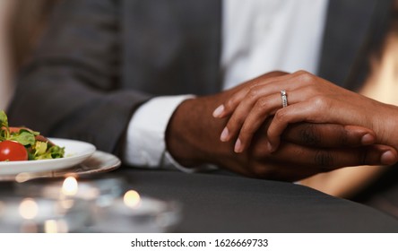 Cropped Of Black Man Holding Woman Hand With Ring On, Got Engaged