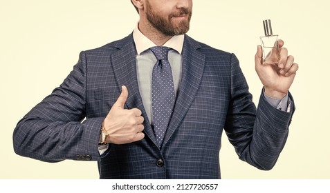 Cropped Businessman With Bottle Of Perfume Show Thumb Up. Mens Fragrance Smell.