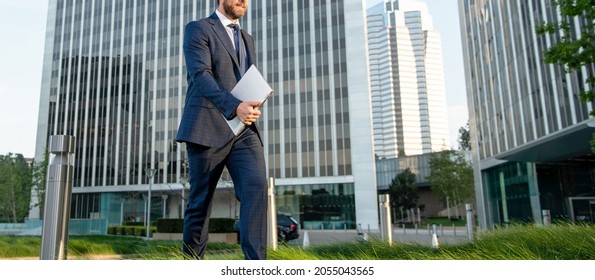 Cropped Businessman In Suit Walking With Laptop Outside The Office, Agile Business