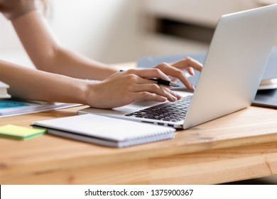 Cropped Close Up Image Woman Hands Holding Pen Typing On Laptop Student Do Homework Prepare Essay Make Research, Businesswoman Communicate Online With Client Solve Business Questions Distantly Concept