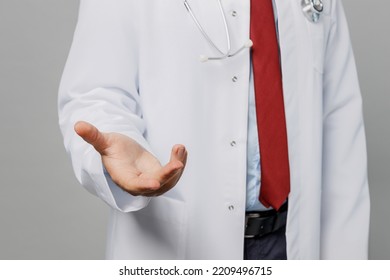 Cropped Close Up Male Doctor Man Wearing White Medical Gown Suit Stethoscope Work In Hospital Stretch Hands To Camera For Greeting Isolated On Plain Grey Color Background Healthcare Medicine Concept