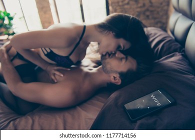 Cropped Close Up Photo Of Telephone, Wife Is Calling. Two Dirty Naughty Hot Sexy Beautiful Attractive Unstoppable Partners Cheating In Hotel Room, Woman Sitting On Muscular Body Kissing Lips