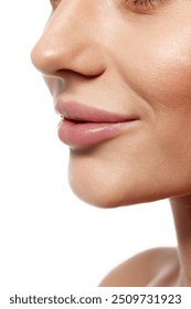 Cropped close-up image of perfect female face with beautiful nose, plump lips and cheekbone, isolated on white studio background. Concept of beauty, plastic surgery, face lifting, face building