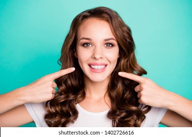 Cropped close-up view portrait of her she nice sweet adorable perfect healthy white cheerful cheery wavy-haired girl every day hygiene isolated over bright vivid shine blue background