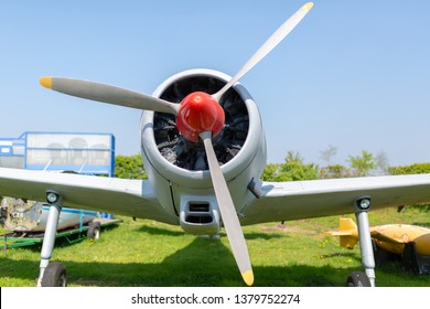 Cropped Colour Photograph Of The Front End Of A Classic Training Prop Plane (P56 Provost) Parked On Grass In Dorset.