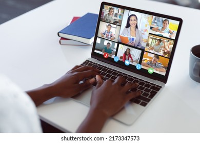 Cropped Hands Of African American Student Typing Laptop Keys While Attending Online Lecture At Home. Video Call, Unaltered, Childhood, Wireless Technology, Education, Student And E-learning Concept.