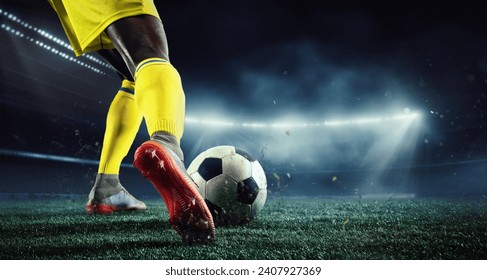 Cropped image of African man's legs, football player in yellow uniform on 3d arena playing, hitting ball. Evening outdoor match. Concept of sport, game, competition, championship. 3D render - Powered by Shutterstock