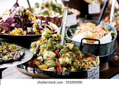 Cropped image of assorted salads in a buffet