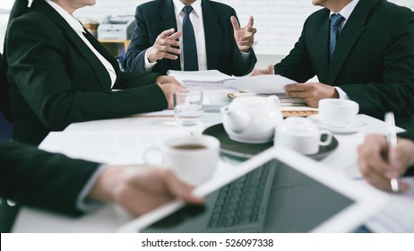 Cropped Image Of Attorneys Discussing Cases, Selective Focus