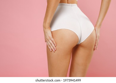 Cropped Image Back Rear View Of Sexy Young Woman 20s Wearing White Underwear With Fit Sports Strong Body Standing Posing Hold Hands On Hips Isolated On Pastel Pink Colour Background, Studio Portrait