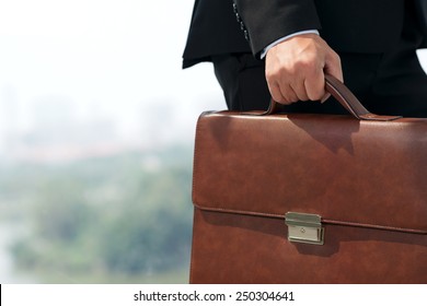 Cropped Image Of Businessman Carrying Briefcase