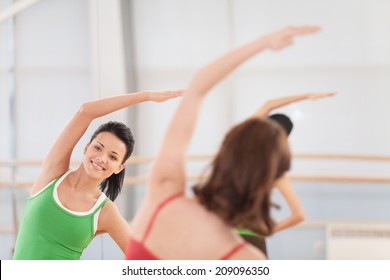 Cropped Image Of Fitness Dance Class Doing Aerobics. Women Dancing Happy Energetic In Gym Fitness Class. 