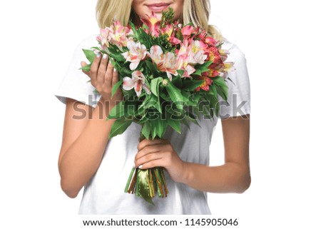 Similar – Woman arranges luxury bouquet of flowers