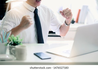 Cropped image of happy businessman with success and gladness concept. - Shutterstock ID 1476527183