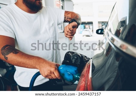 Similar – Image, Stock Photo Checking the time during busy day in Chiang Mai