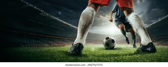 Cropped image of male legs in dirty uniform, football players during game, competing on sport field, 3d outdoor arena. Concept of sport, game, competition, championship. 3D render - Powered by Shutterstock