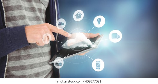 Cropped image of man using tablet against connected world - Powered by Shutterstock