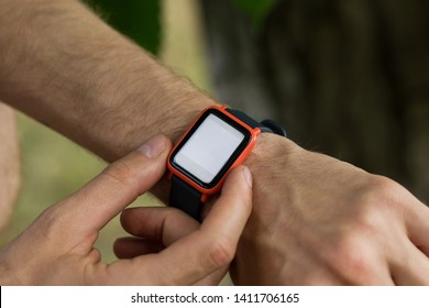 Cropped image of modern smartwatch for checking notification and data via wireless connection. Empty display of modern gadget.