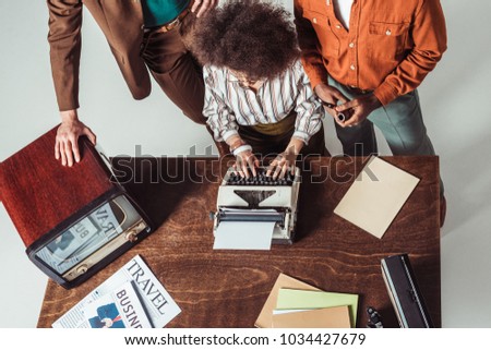 Similar – Image, Stock Photo Crop woman with typewriter putting crumpled paper into glass cup