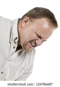 Cropped image of an old man suffering great pain isolated in a white background