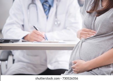 Cropped Image Of Pregnant Woman Visiting Doctor