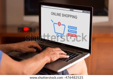 Cropped image of a senior man using his laptop on his couch at home
