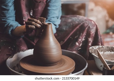 Cropped Image Of Unrecognizable Female Ceramics Maker Working With Pottery Wheel In Workshop Makes A Future Vase Or Mug, Creative People Handcraft Pottery Class