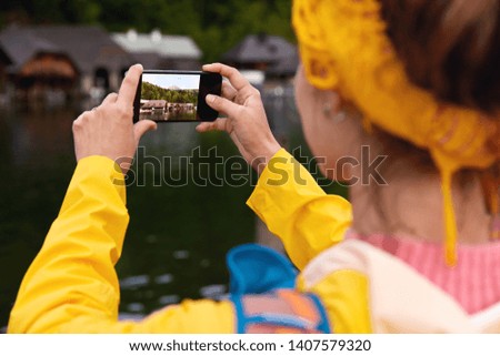 Similar – Image, Stock Photo unrecognizable woman traveling by car with her cute small dog