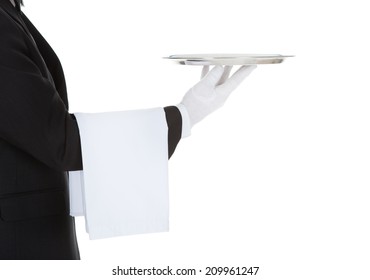Cropped image of waiter holding empty tray over white background
