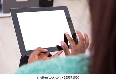 Cropped Image Of Young African American Woman Holding Digital Tablet At Home