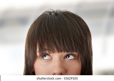 Cropped Image Of A Young Girl With Her Eyes Looking Away Left