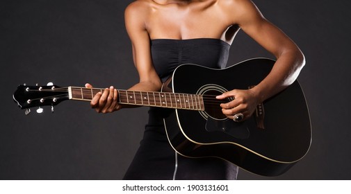 Cropped Photo Of African American Woman Playing Guitar