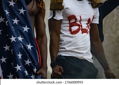 Cropped Photo Of Black People Holding American Flag While Protest, BLM Concept. Anti-racism