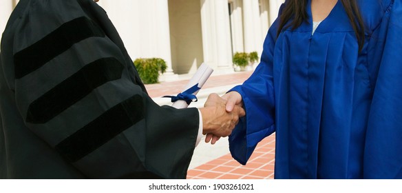 Cropped Photo Of Graduate Receiving Diploma