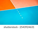 Cropped photo of orange volleyball court with white lines, no one. Professional volleyball courts in sport gym, sporty backdrop. Team game success, healthy sporty lifestyle concept. Copy ad text space