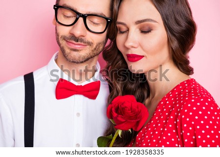 Cropped photo of young couple dream enjoy date feelings romance valentine day isolated over pink color background